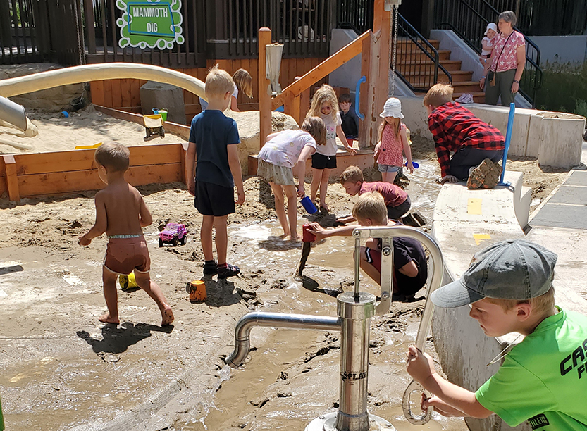 Gilbert children's museum playscape ball wall Learning Landscapes Design nature playground