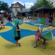 Gilbert children's museum playscape ball wall Learning Landscapes Design nature playground